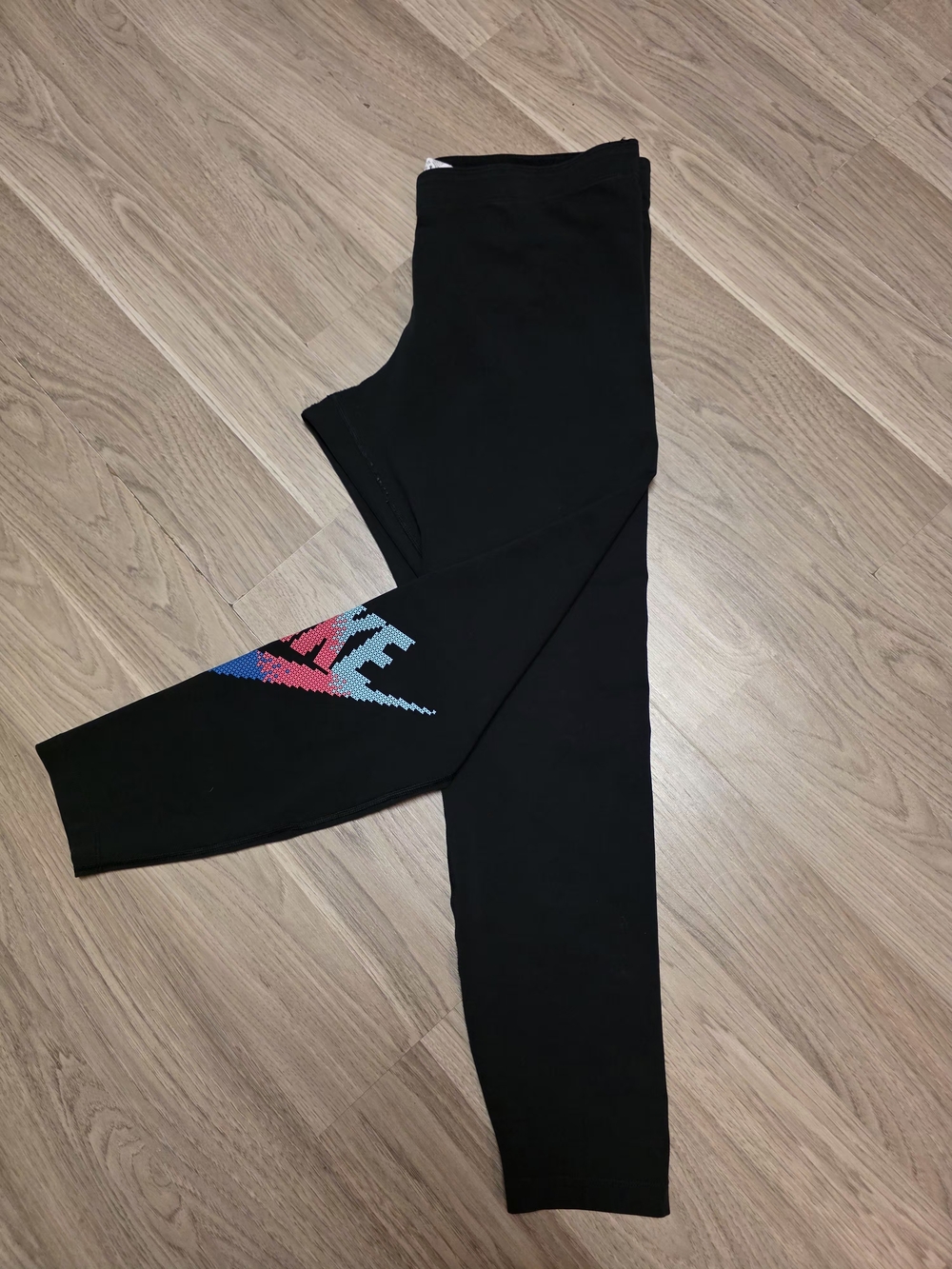 Nike Kids Black Leggings with Pink & Blue Swoosh Accent